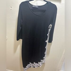 Black asymmetrical dress with white floral pattern down the side